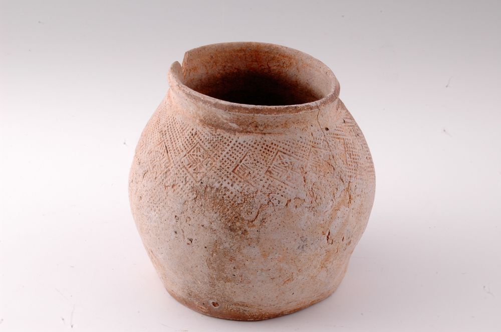 拍印斜方格纹陶罐